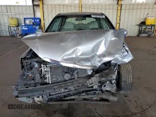 2006 Kia Spectra EX with VIN KNAFE121465332510, listed as a Copart auction lot 77211974 with 148,964 mi miles and Salvage Title. Bid and sale history available at carsss.com. Image 5.
