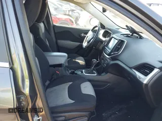 2014 Jeep Cherokee Latitude with VIN 1C4PJLCB1EW153825, listed as a IAAI auction lot 41675220 with 208,943 mi miles. Bid and sale history available at carsss.com. Image 5.