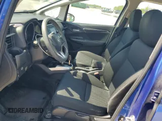 2019 Honda Fit LX z VIN 3HGGK5H4XKM741416, wystawiony jako Copart lot #53819705 z przebiegiem 46 500 mil mil oraz Szkoda całkowita • Salvage title. Historia ofert i sprzedaży dostępna na DreamBid. Obrazek 7.