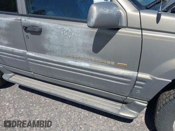 1996 Jeep Grand Cherokee Limited with VIN 1J4GZ78Y1TC162546, listed as a IAAI auction lot 42612646 with 204,098 mi miles and . Bid and sale history available at DreamBid. Image 6.