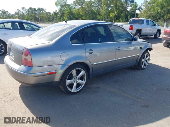 2003 Volkswagen Passat GL z VIN WVWMD63BX3E423052, wystawiony jako IAAI lot #39234258 z przebiegiem 267 688 mil mil oraz . Historia ofert i sprzedaży dostępna na DreamBid. Obrazek 4.
