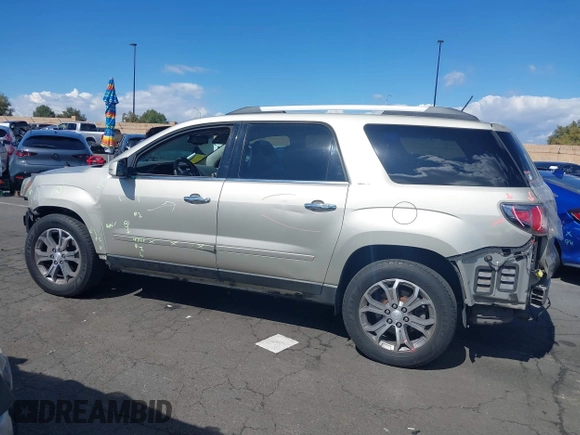 2014 GMC Acadia SLT z VIN 1GKKRSKD2EJ141913, wystawiony jako IAAI lot #41738536 z przebiegiem 100 577 mil mil oraz . Historia ofert i sprzedaży dostępna na DreamBid. Obrazek 14.