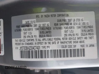 2013 Mazda CX-9 Sport with VIN JM3TB3BA2D0407491, listed as a IAAI auction lot 42430839 with 162,827 mi miles and . Bid and sale history available at DreamBid. Image 9.