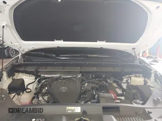 2023 Toyota Highlander L z VIN 5TDKDRBH9PS039746, wystawiony jako IAAI lot #42235258 z przebiegiem 4 513 mil mil oraz . Historia ofert i sprzedaży dostępna na DreamBid. Obrazek 10.
