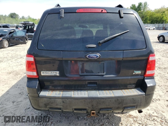 2011 Ford Escape XLT with VIN 1FMCU9DGXBKA90337, listed as a Copart auction lot 56063355 with 122,956 mi miles and Non repairable. Bid and sale history available at DreamBid. Image 6.