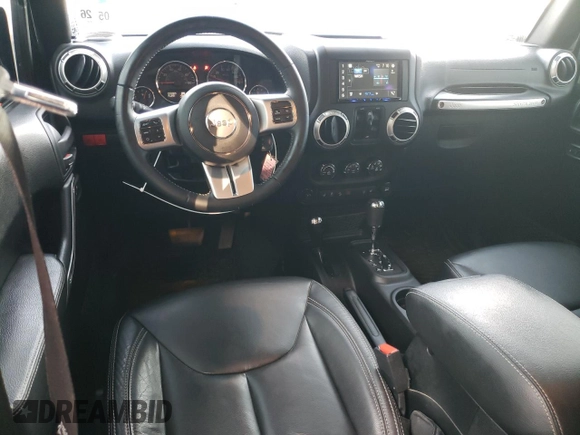 2016 Jeep Wrangler Unlimited Rubicon with VIN 1C4HJWFG9GL220687, listed as a Copart auction lot 60552705 with 49,525 mi miles and Salvage title. Bid and sale history available at DreamBid. Image 8.