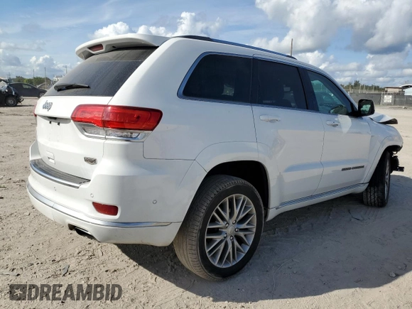 2018 Jeep Grand Cherokee Summit с VIN 1C4RJEJG6JC358829, выставлен на аукционе Copart как лот 85957014 с пробегом 76 084 миль миль и Списание • Salvage title. История ставок и продаж доступна на DreamBid. Изображение 3.