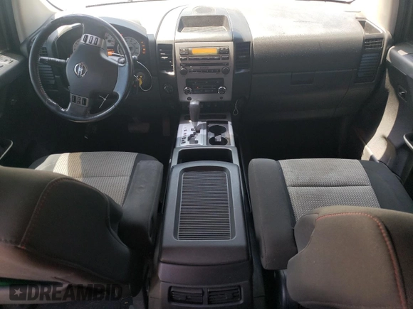 2011 Nissan Titan SL with VIN 1N6BA0ECXBN322611, listed as a Copart auction lot 63002925 with 159,785 mi miles and Salvage title. Bid and sale history available at DreamBid. Image 8.