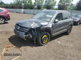 2013 Volkswagen Tiguan SE with VIN WVGBV7AX1DW009495, listed as a Copart auction lot 62289675 with Not provided miles and Salvage title. Bid and sale history available at DreamBid. Image 1.