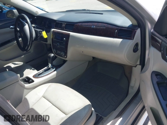 2014 Chevrolet Impala LT with VIN 2G1WB5E34E1178129, listed as a IAAI auction lot 42602823 with 132,713 mi miles and . Bid and sale history available at DreamBid. Image 5.