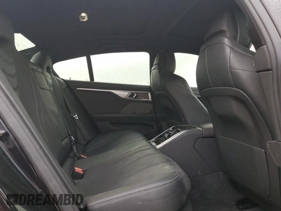 2022 BMW 8 Series M850i z VIN WBAGV8C02NCH18326, wystawiony jako Copart lot #78362624 z przebiegiem 21 393 mil mil oraz Szkody całkowita. Historia ofert i sprzedaży dostępna na DreamBid. Obrazek 10.
