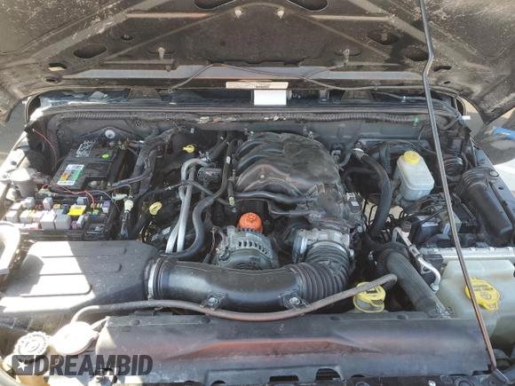 2013 Jeep Wrangler Unlimited Freedom z VIN 1C4BJWDG0DL513902, wystawiony jako Copart lot #52045975 z przebiegiem 166 827 mil mil oraz Szkoda całkowita • Salvage title. Historia ofert i sprzedaży dostępna na DreamBid. Obrazek 11.