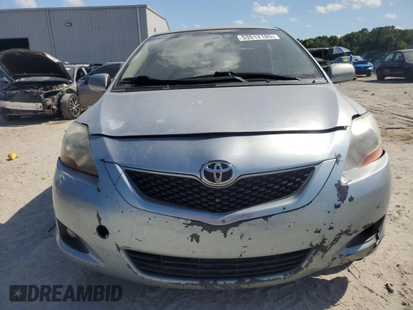 2009 Toyota Yaris with VIN JTDBT903591302633, listed as a Copart auction lot 53512185 with 351,622 mi miles and Salvage Title. Bid and sale history available at carsss.com. Image 5.