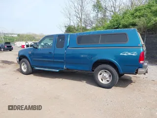 2000 Ford F-150 XL with VIN 1FTRX18W2YNC19493, listed as a IAAI auction lot 42127210 with 115,052 mi miles. Bid and sale history available at carsss.com. Image 3.