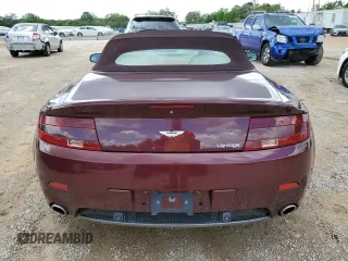 2008 Aston Martin Vantage z VIN SCFBF04B88GD08690, wystawiony jako Copart lot #56514635 z przebiegiem 63 229 mil mil oraz Tytuł czysty. Historia ofert i sprzedaży dostępna na DreamBid. Obrazek 6.