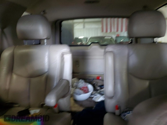 2004 Cadillac Escalade z VIN 1GYEK63N94R252528, wystawiony jako Copart lot #54253175 z przebiegiem Nie podano mil oraz Szkoda całkowita • Salvage title. Historia ofert i sprzedaży dostępna na DreamBid. Obrazek 10.