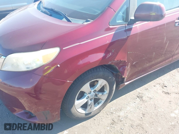 2012 Toyota Sienna LE AAS with VIN 5TDKK3DCXCS244605, listed as a IAAI auction lot 41516400 with 186,198 mi miles. Bid and sale history available at carsss.com. Image 6.