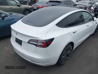 2022 Tesla Model 3 with VIN 5YJ3E1EA7NF108758, listed as a IAAI auction lot 41824437 with Not Provided miles. Bid and sale history available at carsss.com. Image 4.