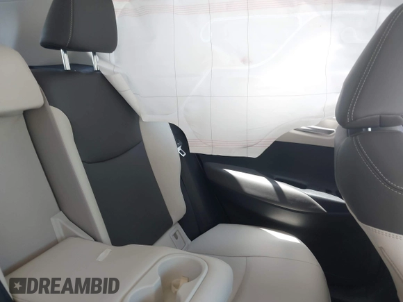 2023 Toyota Corolla Cross XLE z VIN 7MUDAABG7PV049417, wystawiony jako IAAI lot #42037055 z przebiegiem 28 325 mil mil oraz . Historia ofert i sprzedaży dostępna na DreamBid. Obrazek 8.