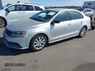 2015 Volkswagen Jetta Sedan 1.8T SE with VIN 3VWD17AJXFM324283, listed as a IAAI auction lot 41769785 with 103,686 mi miles. Bid and sale history available at carsss.com. Image 2.