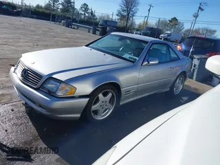 1999 Mercedes-Benz SL-Class with VIN WDBFA68F6XF181288, listed as a IAAI auction lot 41687202 with 63,259 mi miles. Bid and sale history available at carsss.com. Image 2.