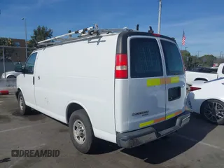 2014 Chevrolet Express Cargo Van with VIN 1GCWGFCB2E1122236, listed as a IAAI auction lot 41381131 with 70,696 mi miles. Bid and sale history available at carsss.com. Image 3.