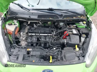 2014 Ford Fiesta SE z VIN 3FADP4EJ8EM233754, wystawiony jako IAAI lot #42108955 z przebiegiem 113 325 mil mil oraz . Historia ofert i sprzedaży dostępna na DreamBid. Obrazek 10.