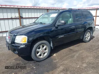2005 GMC Envoy SLE with VIN 1GKDT13S552212811, listed as a IAAI auction lot 41996953 with 147,896 mi miles. Bid and sale history available at carsss.com. Image 2.