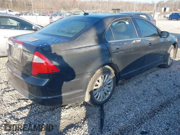 2010 Ford Fusion Hybrid with VIN 3FADP0L32AR100367, listed as a IAAI auction lot 41770303 with 253,334 mi miles. Bid and sale history available at carsss.com. Image 4.