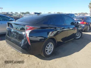 2016 Toyota Prius Two with VIN JTDKBRFU1G3515941, listed as a IAAI auction lot 41053971 with 110,585 mi miles. Bid and sale history available at carsss.com. Image 4.