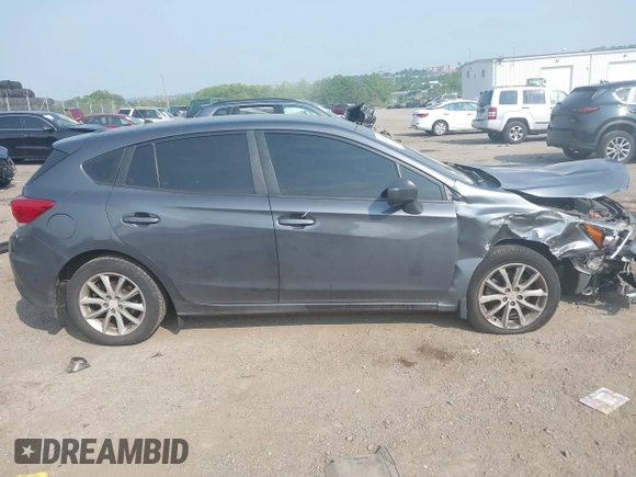 2018 Subaru Impreza with VIN 4S3GTAA63J3748319, listed as a IAAI auction lot 42441310 with 71,616 mi miles and . Bid and sale history available at DreamBid. Image 13.