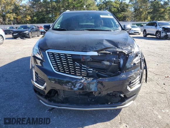 2023 Cadillac XT5 FWD Premium Luxury with VIN 1GYKNCR40PZ189444, listed as a Copart auction lot 84803094 with 22,827 mi miles and Clean Title. Bid and sale history available at carsss.com. Image 5.