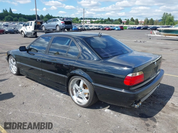 2001 BMW 7 Series 740i with VIN WBAGG83481DN86607, listed as a IAAI auction lot 42686666 with 115,753 mi miles and . Bid and sale history available at DreamBid. Image 3.