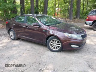 2013 Kia Optima LX z VIN 5XXGM4A76DG149409, wystawiony jako IAAI lot #42422240 z przebiegiem 229 152 mil mil oraz . Historia ofert i sprzedaży dostępna na DreamBid. Obrazek 1.