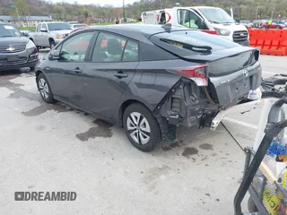 2018 Toyota Prius Two with VIN JTDKARFU7J3553216, listed as a IAAI auction lot 41979005 with 61,818 mi miles. Bid and sale history available at carsss.com. Image 3.