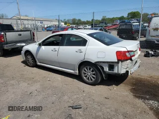 2010 Mitsubishi Galant FE z VIN 4A32B2FF1AE012718, wystawiony jako Copart lot #54487945 z przebiegiem 132 109 mil mil oraz Szkody całkowita. Historia ofert i sprzedaży dostępna na DreamBid. Obrazek 2.