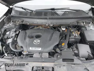 2016 Mazda CX-9 Grand Touring with VIN JM3TCBDY1G0103560, listed as a IAAI auction lot 41344813 with 123,588 mi miles and . Bid and sale history available at DreamBid. Image 10.