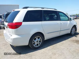 2005 Toyota Sienna XLE with VIN 5TDZA22C25S350614, listed as a IAAI auction lot 42179349 with 219,852 mi miles and . Bid and sale history available at carsss.com. Image 4.