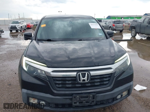 2017 Honda Ridgeline RTL-T with VIN 5FPYK2F64HB003542, listed as a IAAI auction lot 42171243 with 102,071 mi miles and . Bid and sale history available at DreamBid. Image 6.