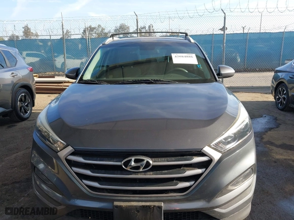 2017 Hyundai Tucson SE Plus with VIN KM8J33A40HU329666, listed as a IAAI auction lot 42084886 with 144,785 mi miles. Bid and sale history available at carsss.com. Image 12.