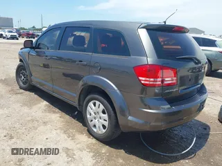 2015 Dodge Journey American Value z VIN 3C4PDCAB2FT637391, wystawiony jako IAAI lot #42354094 z przebiegiem 130 743 mil mil oraz . Historia ofert i sprzedaży dostępna na DreamBid. Obrazek 3.