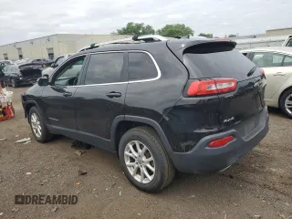 2017 Jeep Cherokee Latitude with VIN 1C4PJMCS0HW529604, listed as a Copart auction lot 60801095 with 95,900 mi miles and Salvage title. Bid and sale history available at DreamBid. Image 2.