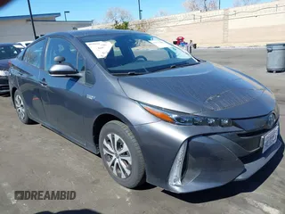 2022 Toyota Prius LE z VIN JTDKAMFP0N3210606, wystawiony jako IAAI lot #41674546 z przebiegiem 21 781 mil mil oraz . Historia ofert i sprzedaży dostępna na DreamBid. Obrazek 1.