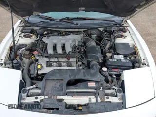 1995 Ford Probe z VIN 1ZVLT22B7S5124333, wystawiony jako IAAI lot #42259542 z przebiegiem 109 313 mil mil oraz . Historia ofert i sprzedaży dostępna na DreamBid. Obrazek 10.