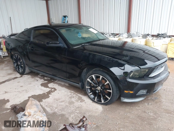 2012 Ford Mustang V6 Premium with VIN 1ZVBP8AM5C5223787, listed as a IAAI auction lot 42141944 with 73,960 mi miles. Bid and sale history available at carsss.com. Image 1.