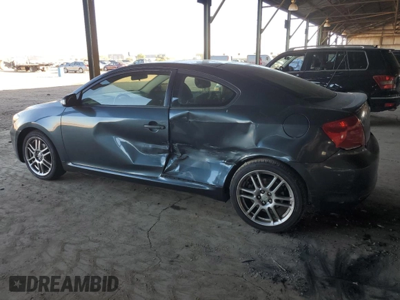2005 Scion tC with VIN JTKDE177950027533, listed as a Copart auction lot 77613954 with 179,691 mi miles and Salvage Title. Bid and sale history available at carsss.com. Image 2.