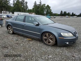 2005 Volkswagen Phaeton z VIN WVWAF03D758003746, wystawiony jako Copart lot #57449525 z przebiegiem 177 257 mil mil oraz Szkoda całkowita • Salvage title. Historia ofert i sprzedaży dostępna na DreamBid. Obrazek 4.