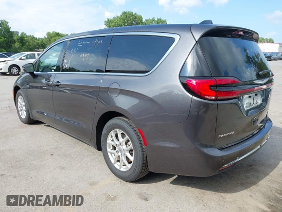 2023 Chrysler Pacifica Touring L with VIN 2C4RC1BG6PR612749, listed as a IAAI auction lot 42612932 with 69,931 mi miles and . Bid and sale history available at DreamBid. Image 3.