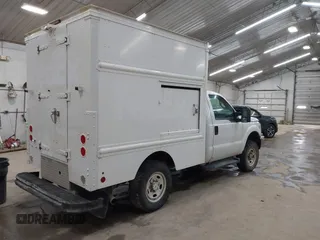 2016 Ford Super Duty F-250 SRW XL with VIN 1FDBF2B66GED17519, listed as a IAAI auction lot 41972443 with 333,161 mi miles. Bid and sale history available at carsss.com. Image 4.