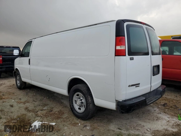 2014 Chevrolet Express Cargo Van with VIN 1GCWGGBA3E1213546, listed as a Copart auction lot 77206984 with 309,311 mi miles and Clean Title. Bid and sale history available at carsss.com. Image 2.